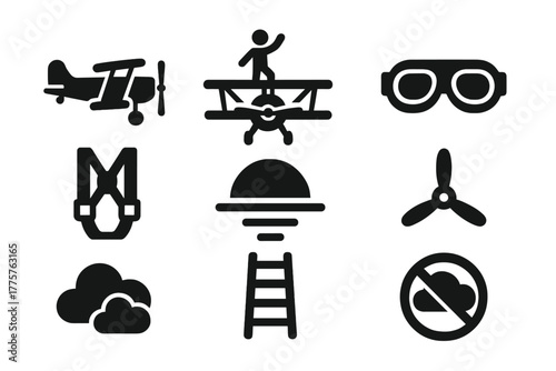 Vintage Air Stunt Icons. Solid style icons of Vintage Air Stunts: Biplane, Wingwalker, Goggles, Safety Harness, Sky, Propeller,