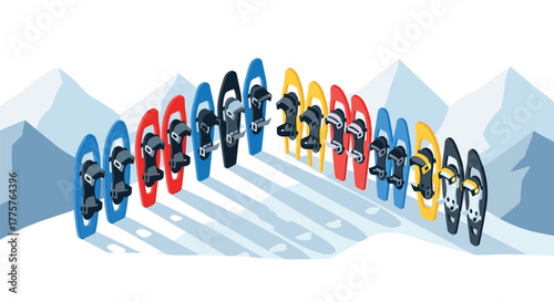 Colorful snowshoes in a row on a winter mountain landscape