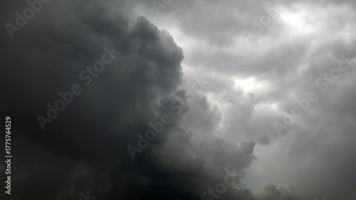 Dense cumulonimbus clouds dissipate and open air after storm