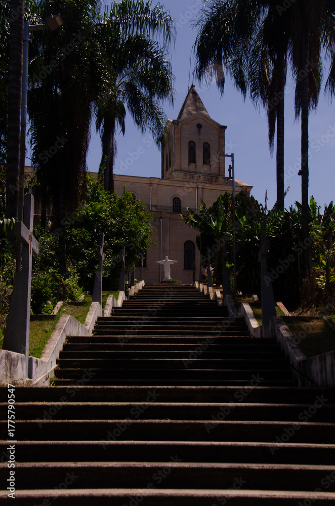Naklejka premium staircase in the santa olimpia neighborhood, in piracicaba, with the Maria Estrela da evangelização Parish in the background