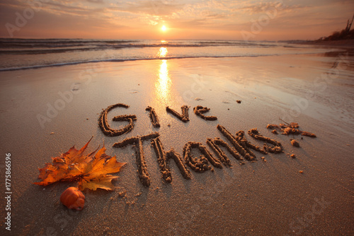 Fototapeta Naklejka Na Ścianę i Meble -  Elegant “Give Thanks” Script Drawn in Sand, Serene Shore and Open Negative Space – great for mindfulness campaigns