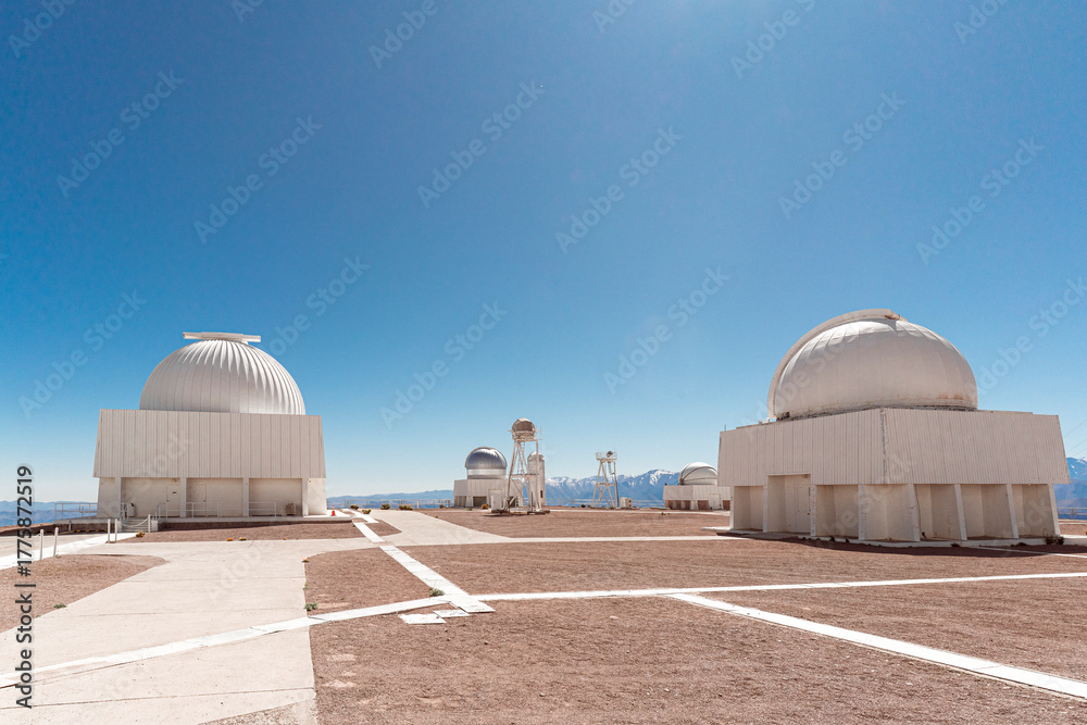 Fototapeta premium Astronomical observatory under clear blue sky in Cerro Tololo, northern Chile