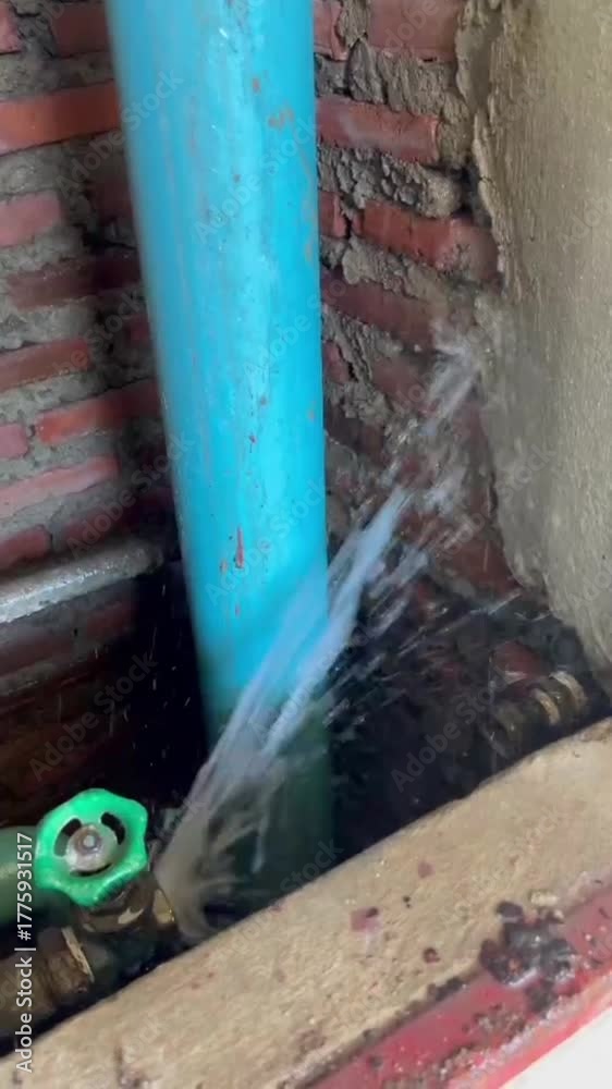 custom made wallpaper toronto digitalPlumber repairing a broken PVC water pipe with strong water leakage, maintenance and plumbing repair work in progress, fixing damaged water supply system, home repair and renovation concept.