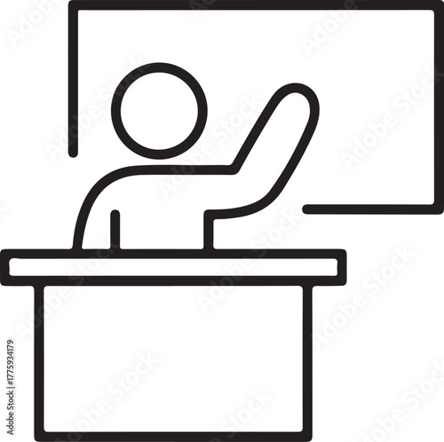 Student raising hand at desk in front of whiteboard