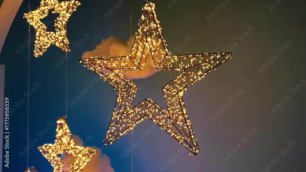 Christmas stars hanging on the wall