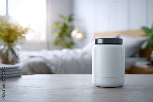 White plastic jar on light wooden table in a bedroom interior