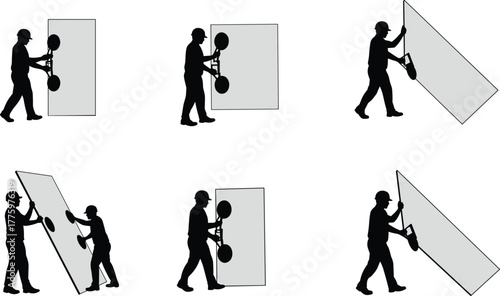 Silhouette of construction workers handling large glass panels with suction cups, safety installation and glazing process, industrial teamwork and building work background