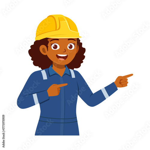 African American woman engineer in workwear and hardhat pointing with smile