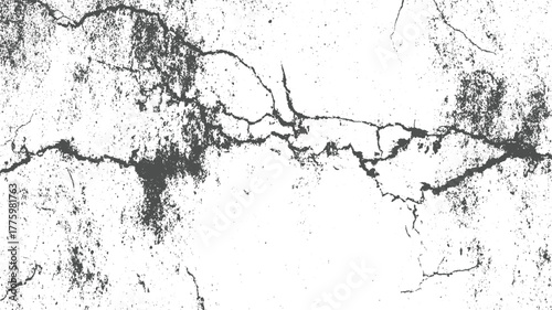 Dark grey cracks and speckles on a white textured background grunge cracked