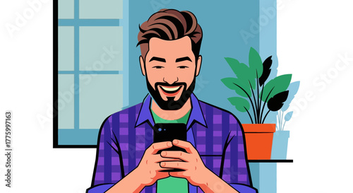 Happy man smiling while browsing on his smartphone indoors with a plant nearby