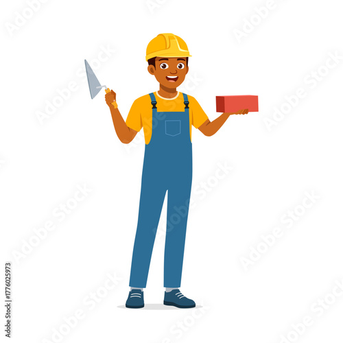 African American bricklayer holding trowel and brick wearing overalls with happy expression