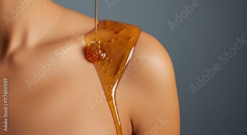 Honey/Oil Dripping on Woman's Shoulder for Skincare