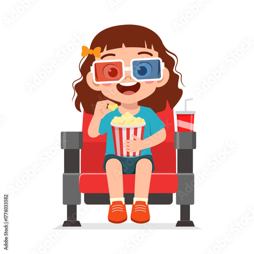Little Girl Watching Movie with 3D Glasses Eating Popcorn in Theater with Happy Expression