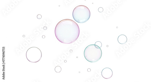 Collection of iridescent soap bubbles floating in the air, isolated on transparent background