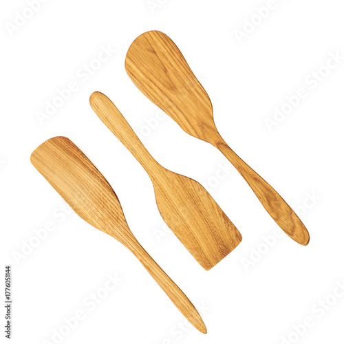 Three wooden kitchen spatulas on a white background