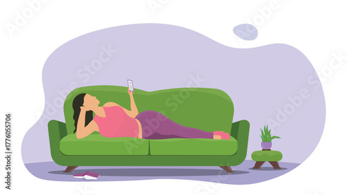 Young woman relaxing on green sofa using smartphone in living room, leisure and comfort concept