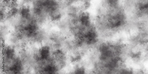 Abstract background texture: dark storm clouds with motion, black and white sky, fog, and light