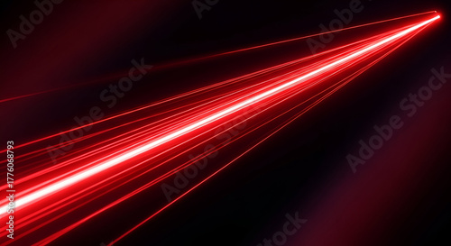 Radiant red laser beams shining through a dark void, symbolizing energy and innovation