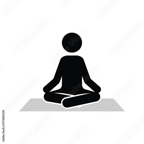 Simple silhouette of a person meditating in a zen lotus position on a mat