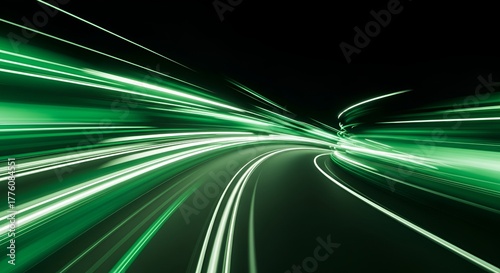 Abstract green light trails with motion blur effect against a dark background