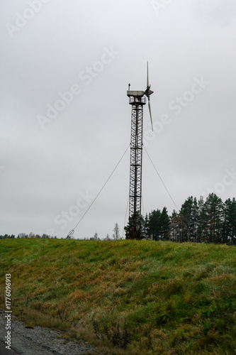 Old tower wind small wind turbine on top