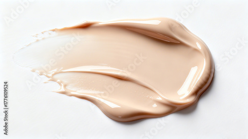 Luxurious creamy cosmetic texture applied on a white background