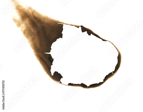 burned hole in white paper background texture. Burn in paper with brown edges and flames isolated on a transparent background.