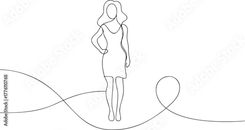 Woman in simple dress standing with hand on hip female