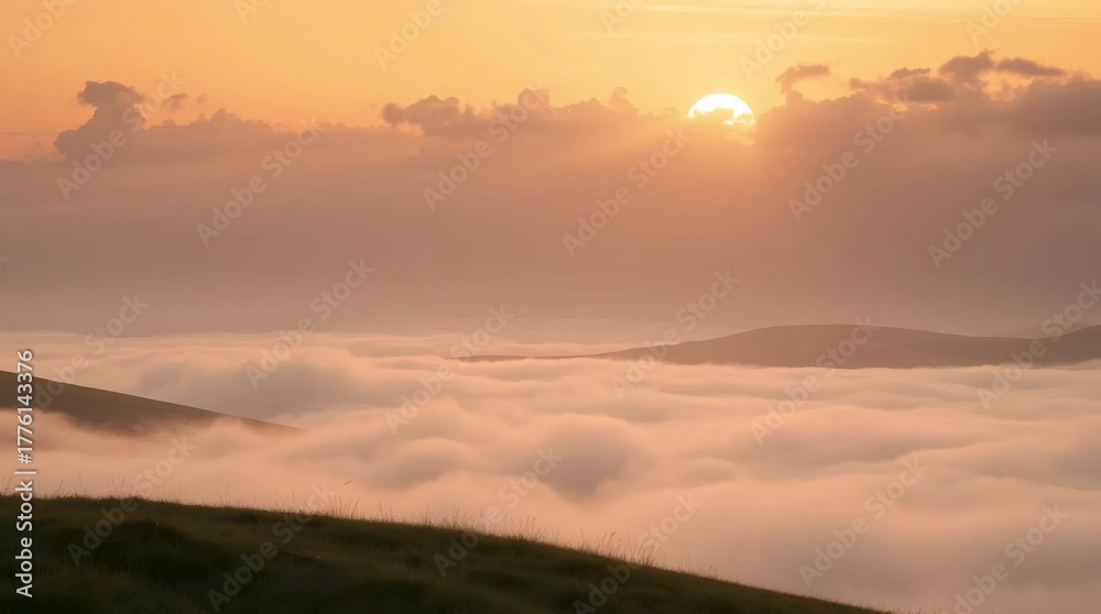 Obraz premium soft golden sunlight shining above foggy clouds at dawn forming dreamy warm natural sunrise landscape scene