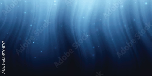 Underwater light rays in deep blue sea abstract background with sunbeams perfect for marine life and ocean concepts