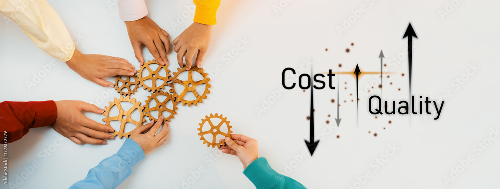 Obraz premium A diverse group of hands engages in assembling gears, symbolizing teamwork and the balance of cost and quality in effective business strategies. Trope
