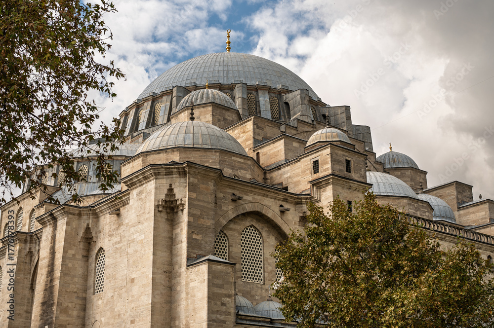Fototapeta premium Suleymaniye Mosque domes and arches architectural details, beautiful Ottoman landmark in Istanbul Turkey. History concept