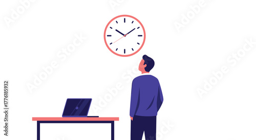 Young man in an office setting standing by his desk with a laptop and looking up at a wall clock, tracking time.