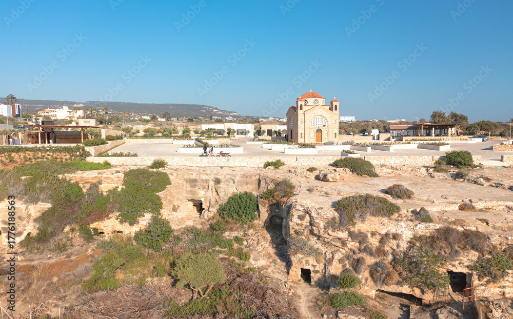 Obraz premium Agios Georgios Church overlooking ancient tombs in Pegeia, Cyprus