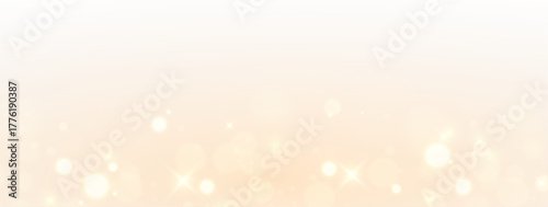 Glitter magic glowing dust sparkle trail floating through golden illumination.
