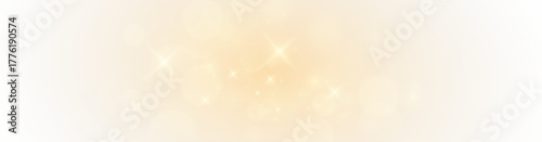 Glowing magic dust sparkle glitter shining softly across golden festive particles.
