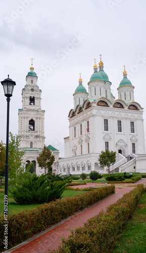 View of the Astrakhan Kremlin with the Assumption Cathedral and the bell tower on a cloudy day. Astrakhan, Russia
