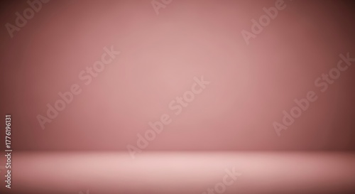 Empty dusty rose studio room background with a soft gradient and vignette for product display.