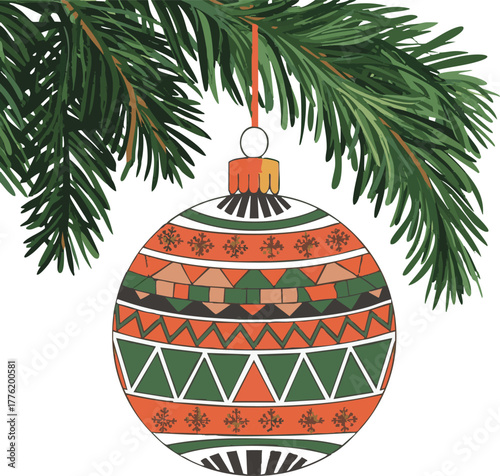 A colorful christmas ornament hangs delicately from a lush green pine branch