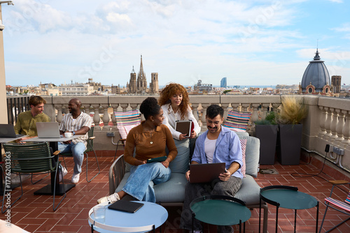 Photography Diverse business team collaborating on barcelona rooftop