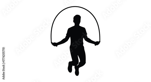 Silhouette of a person jumping rope in mid air with the rope forming an arc above their head