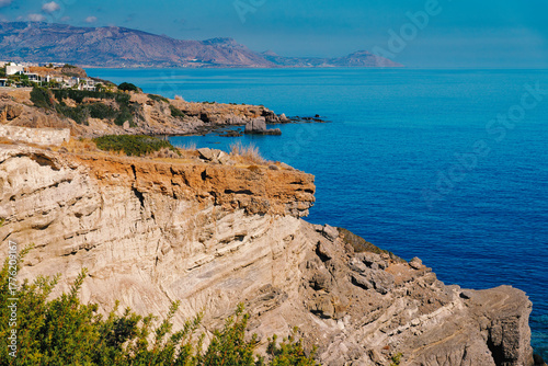 Impressive steep coastline at Achlia on South Crete with dramatic cliffs and rugged shoreline