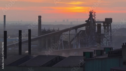 Aerial drone view of Industrial steel factory, iron works. Metallurgical plant. steelworks. Heavy industry in Europe, Poland, Dabrowa Gornicza. Air pollution from chimneys. Ecology and environmental