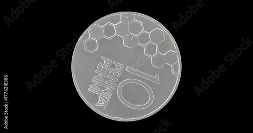 Reverse of Finland coin 10 penni 2000, isolated in black background. Loopable animation in 4k resolution video