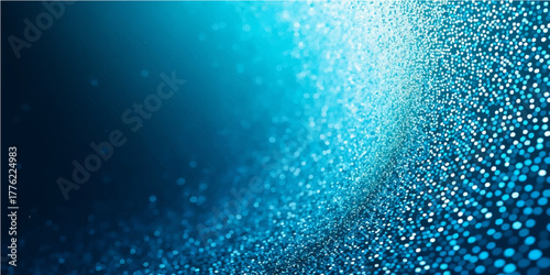 Abstract blue background with clear water drops and light bubbles forming a dynamic ocean pattern