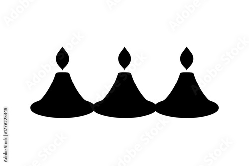 Decorative candles in a row showcasing warm light for a cozy ambiance in a simple setting