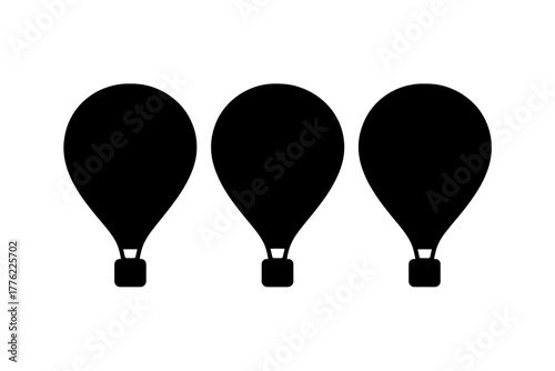 Hot air balloons floating in the sky during a colorful festival celebration on a sunny day