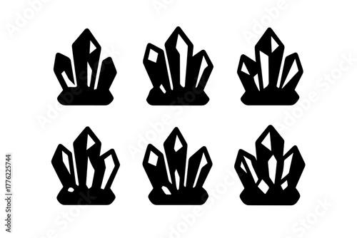 Various crystal shapes in black silhouette displayed on a plain background