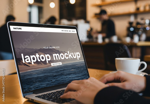 Person using a laptop in a bar or café - mockup