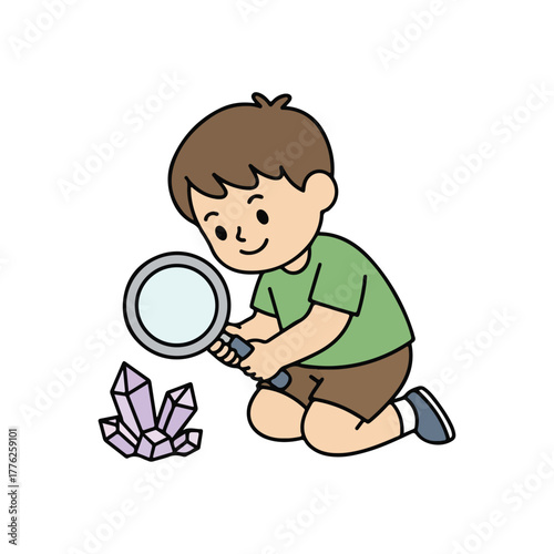 Boy exploring nature with magnifying glass